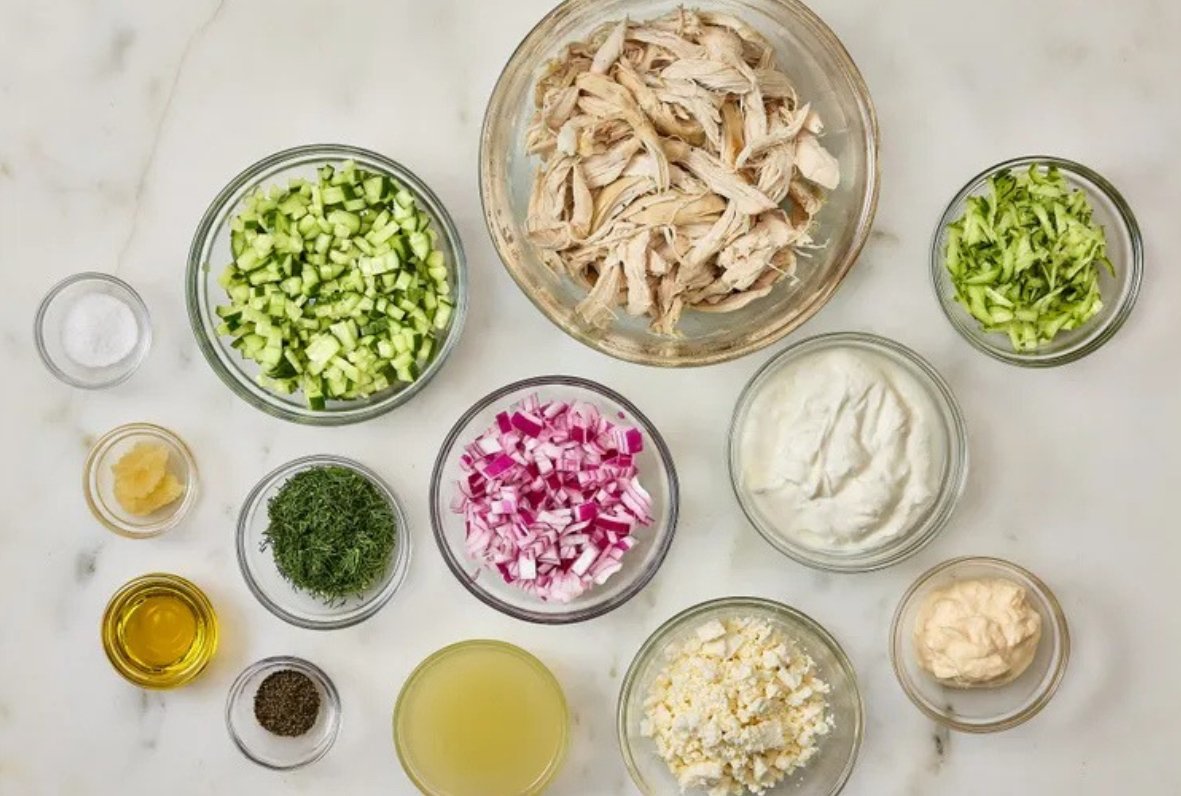 A creamy bowl of Tzatziki Chicken Salad with cucumber, dill, and feta.